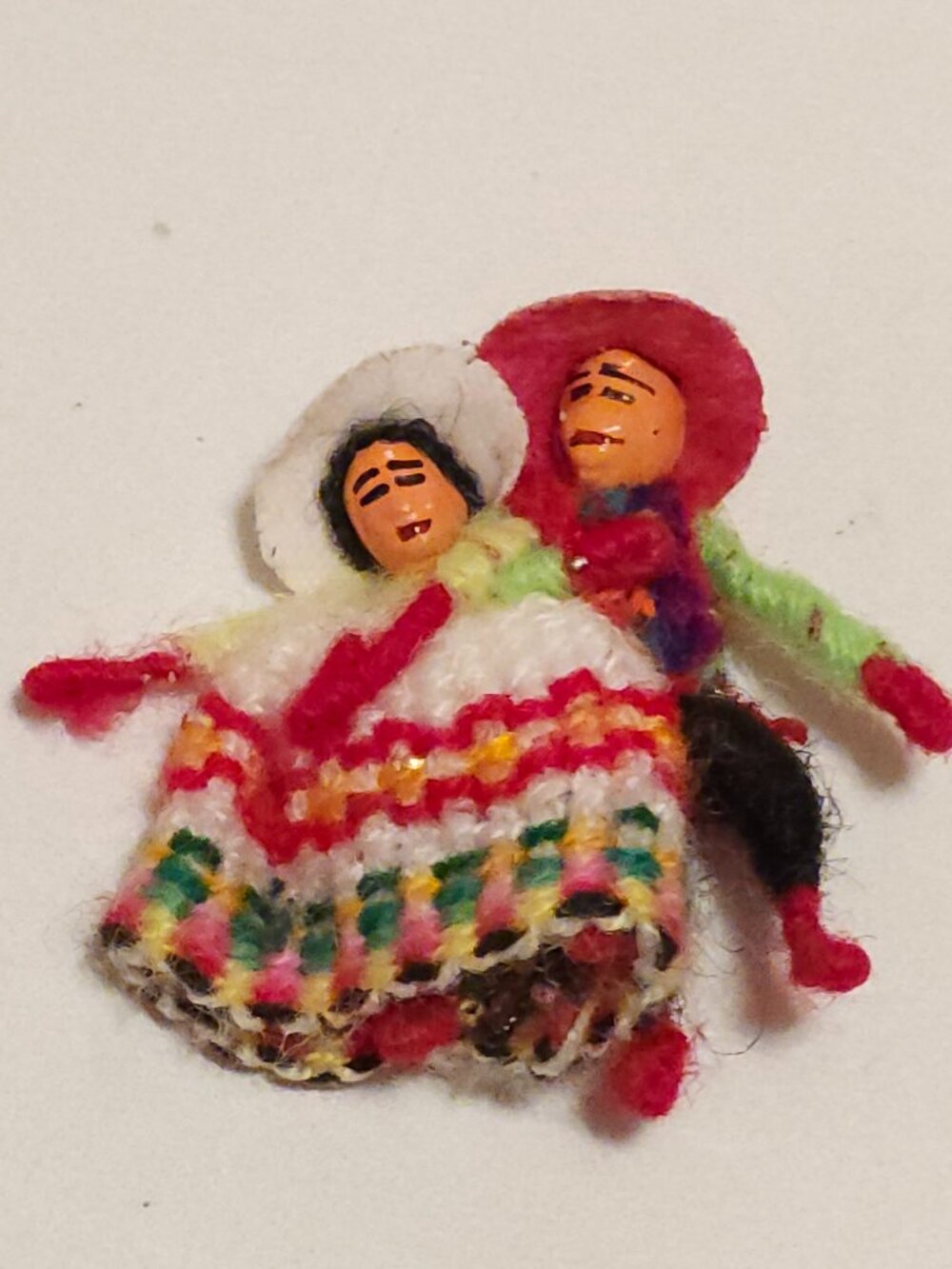 HANDCRAFTED Peruvian worry doll couple brooch pin featuring tiny dancing figures
